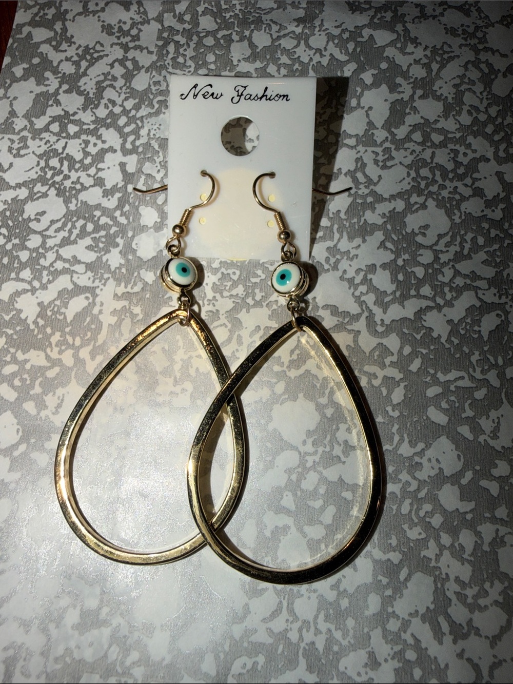Gold Teardrop Earrings with evil eye